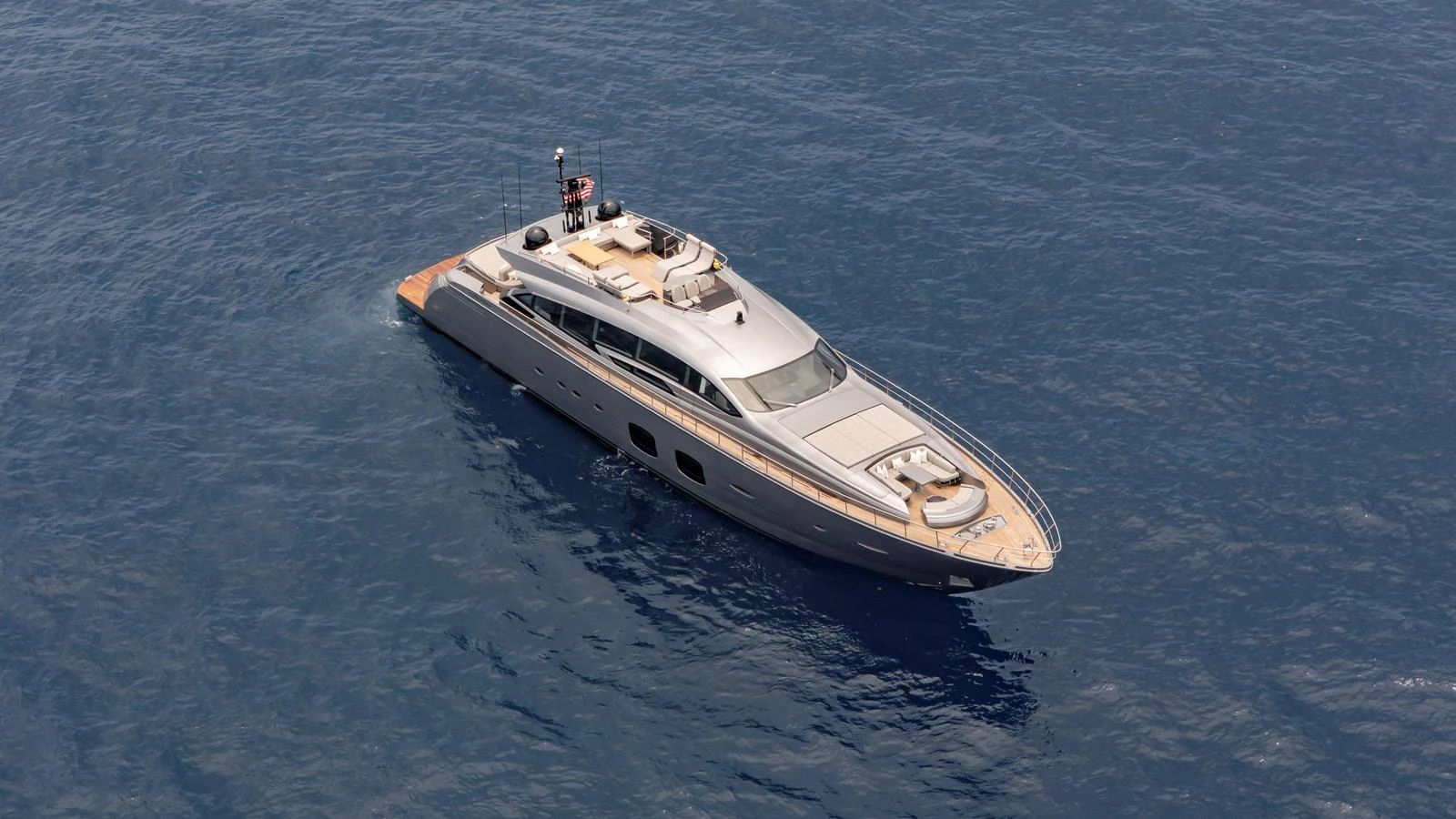 A sleek and modern yacht glides gracefully on the open water, showcasing its elegant design. aboard ANDIAMO II Yacht for Sale