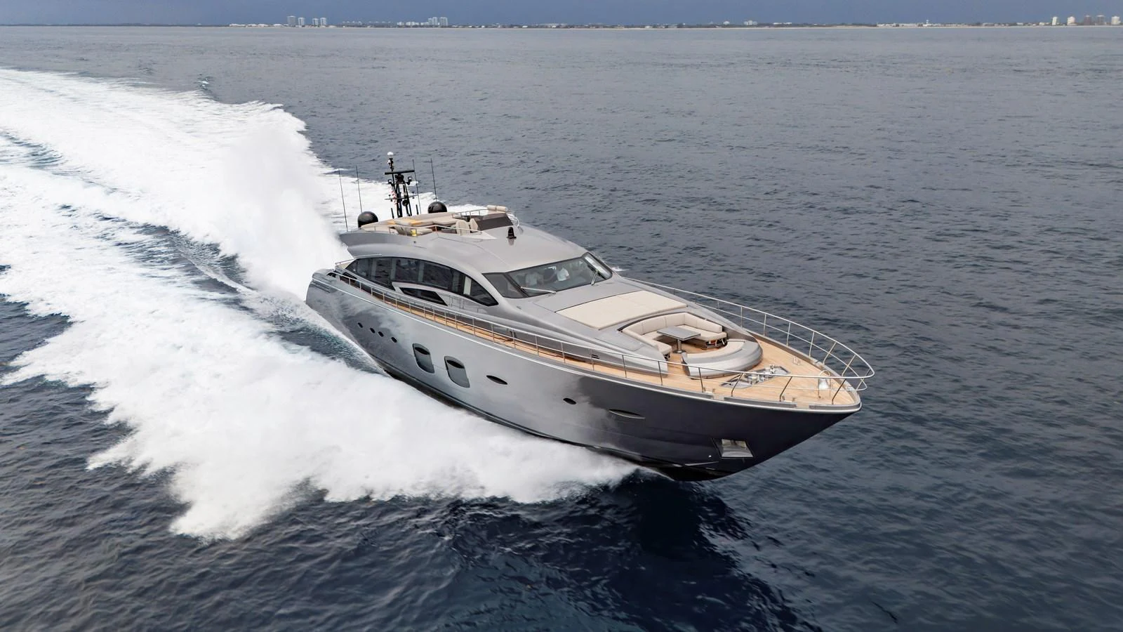 A sleek and modern yacht cruises swiftly through the open water, showcasing its elegant design and powerful performance. aboard ANDIAMO II Yacht for Sale
