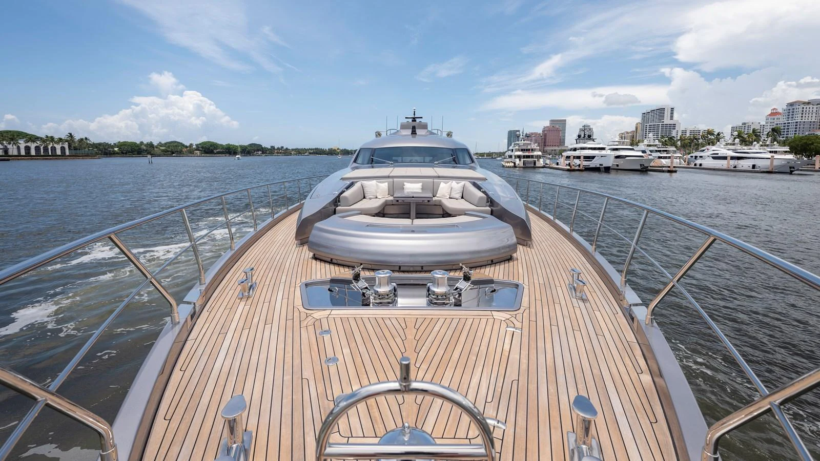 The yacht's foredeck offers a spacious and inviting area with comfortable seating and stunning views. aboard ANDIAMO II Yacht for Sale