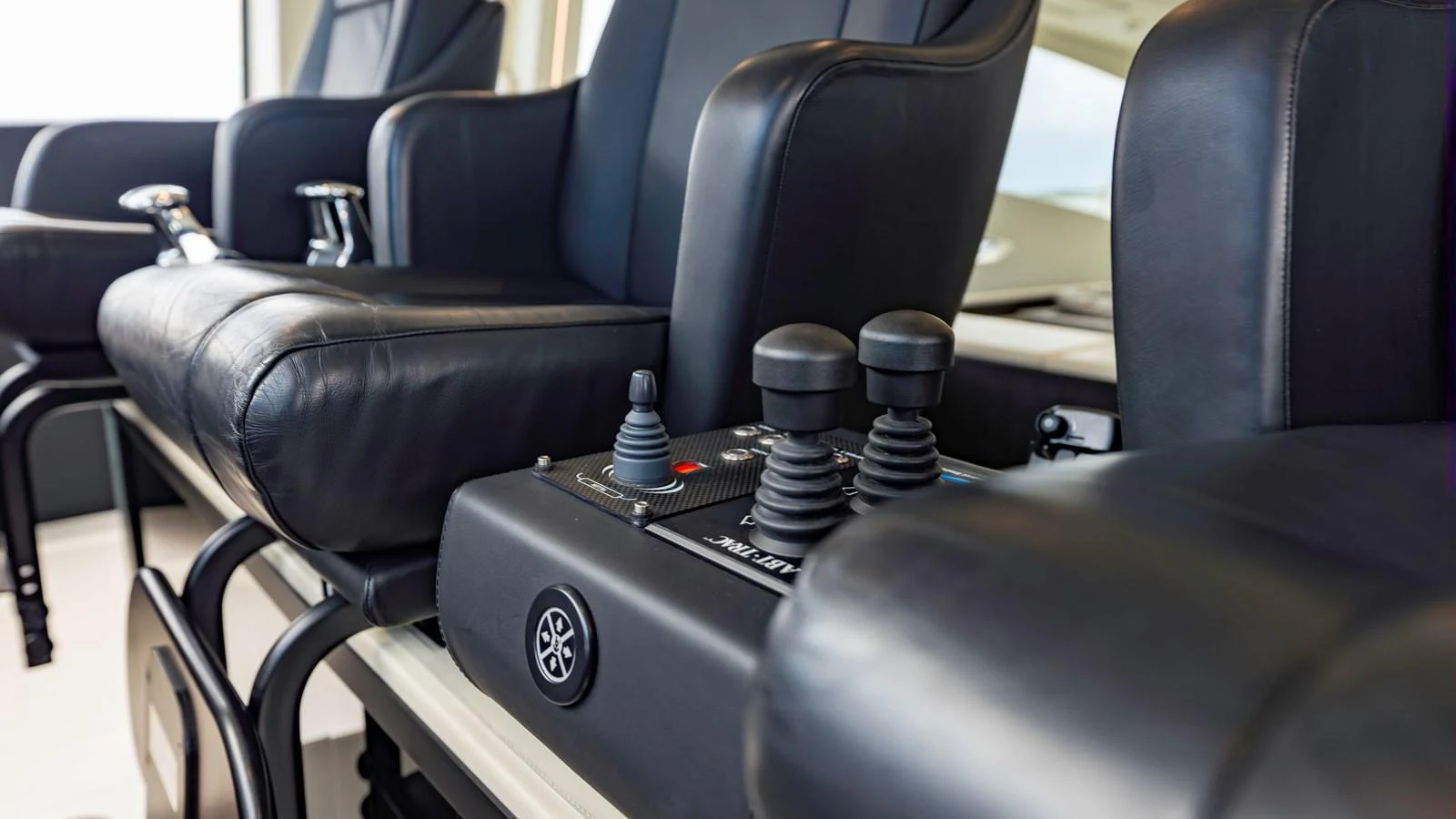 The helm features comfortable leather seating and advanced control systems. aboard ANDIAMO II Yacht for Sale