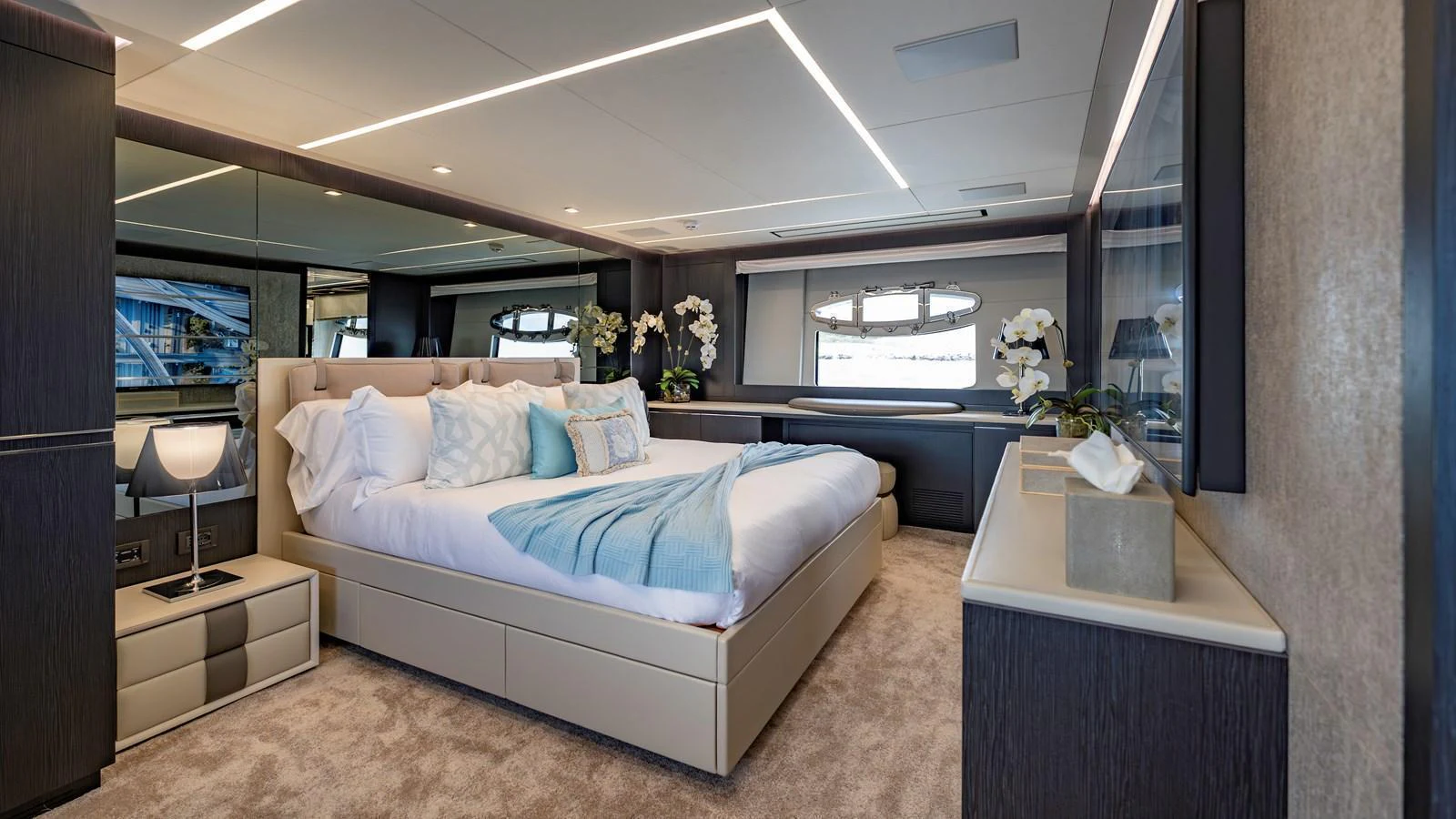 The master stateroom exudes luxury with its spacious layout and elegant decor. aboard ANDIAMO II Yacht for Sale