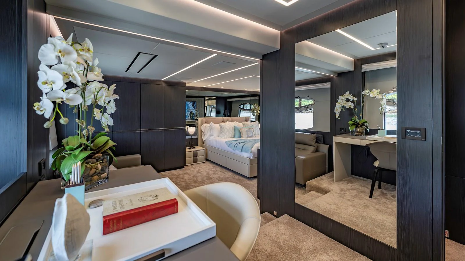 The master stateroom features elegant decor with plush furnishings and modern amenities. aboard ANDIAMO II Yacht for Sale