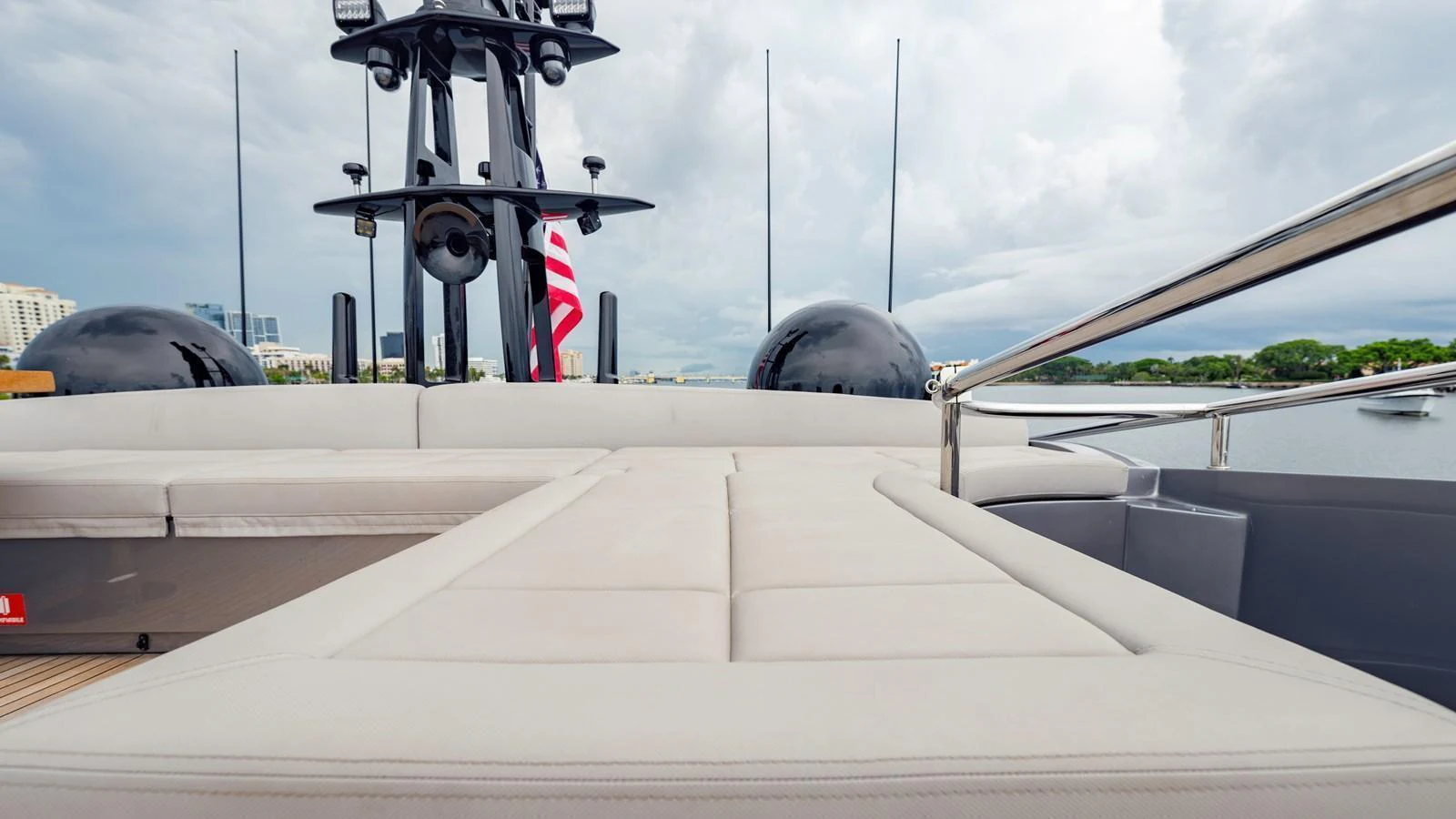 The sundeck offers a spacious and comfortable lounging area with a view of the surroundings. aboard ANDIAMO II Yacht for Sale