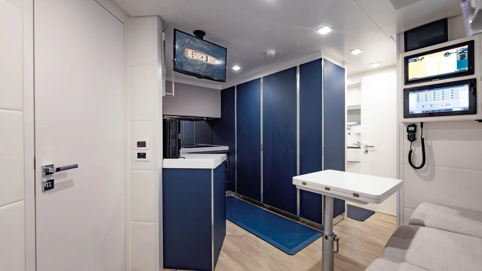 The yacht's interior features a modern and functional space with a sleek design and advanced technology. aboard ANDIAMO II Yacht for Sale