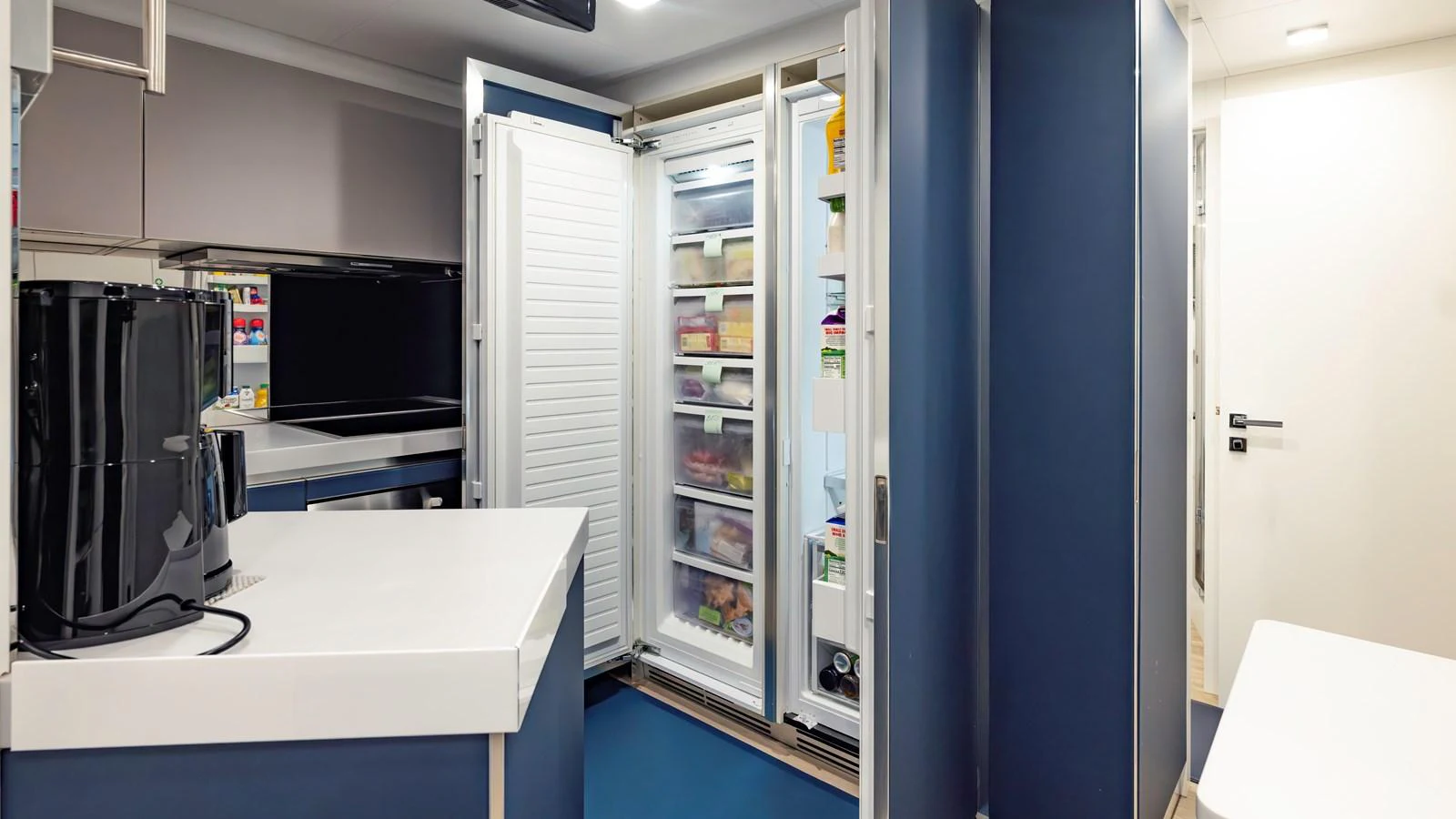 The galley features modern appliances and ample storage space, ensuring a functional and stylish cooking area. aboard ANDIAMO II Yacht for Sale