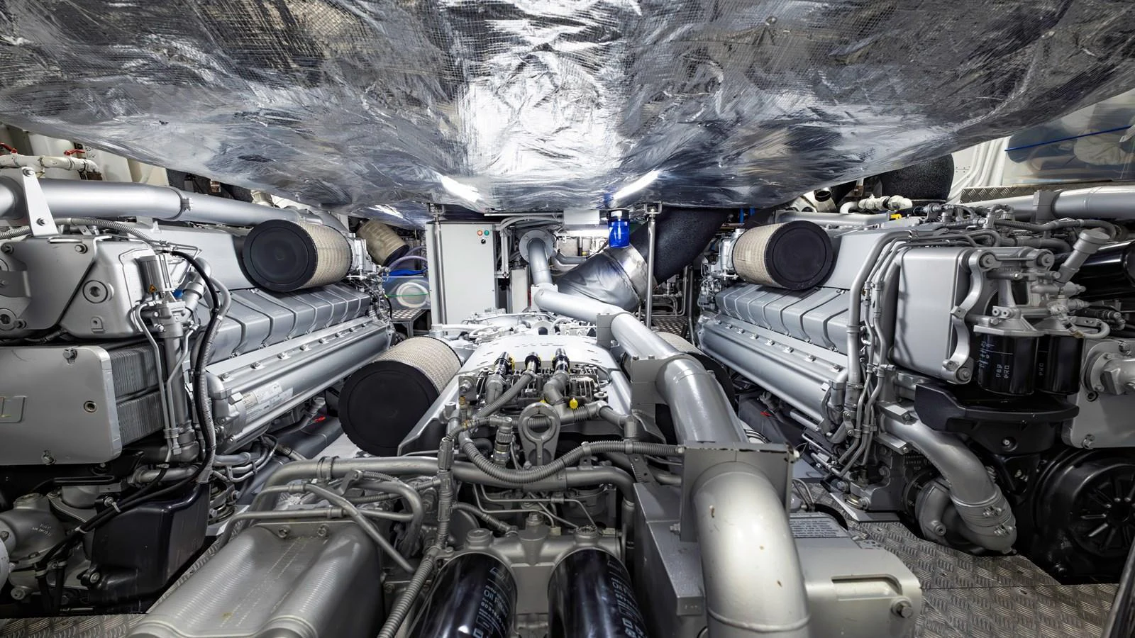 The image showcases the yacht's meticulously maintained engine room with powerful machinery. aboard ANDIAMO II Yacht for Sale