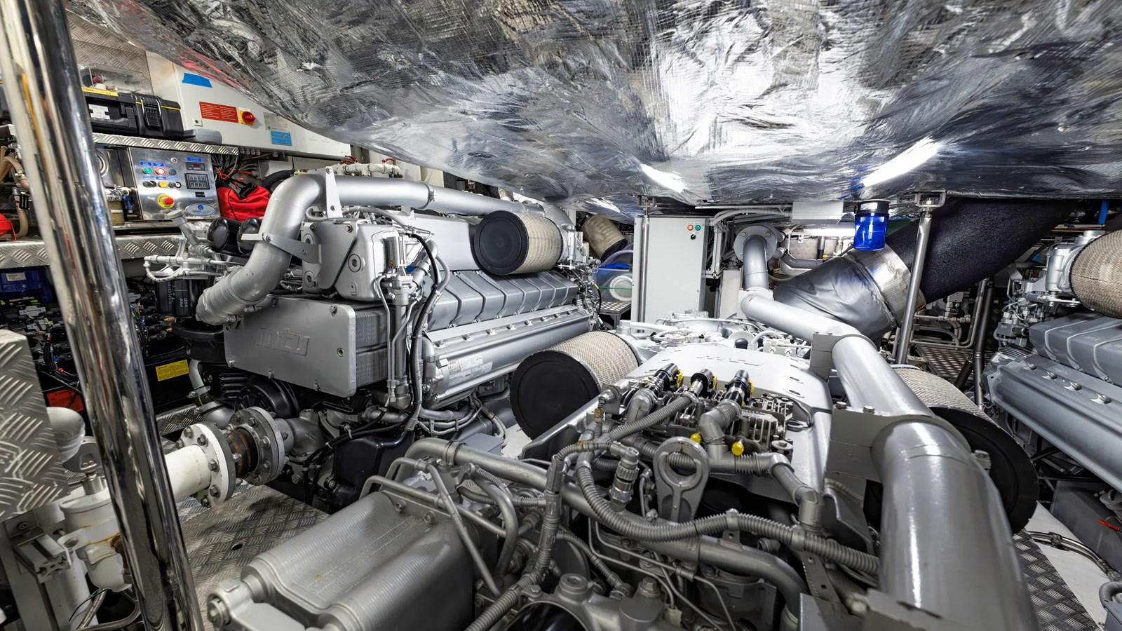 The image showcases the meticulously maintained engine room with powerful machinery and advanced systems. aboard ANDIAMO II Yacht for Sale