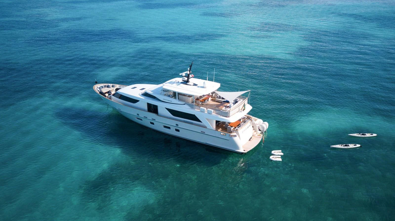 a white boat in the water aboard FONTANA Yacht for Sale