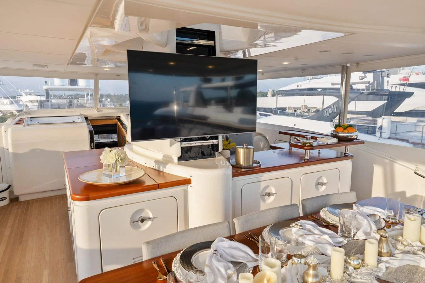 a kitchen with a large tv aboard FONTANA Yacht for Sale