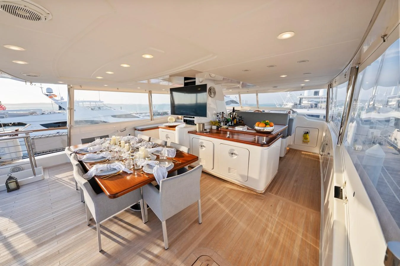 a kitchen with a table and chairs aboard FONTANA Yacht for Sale