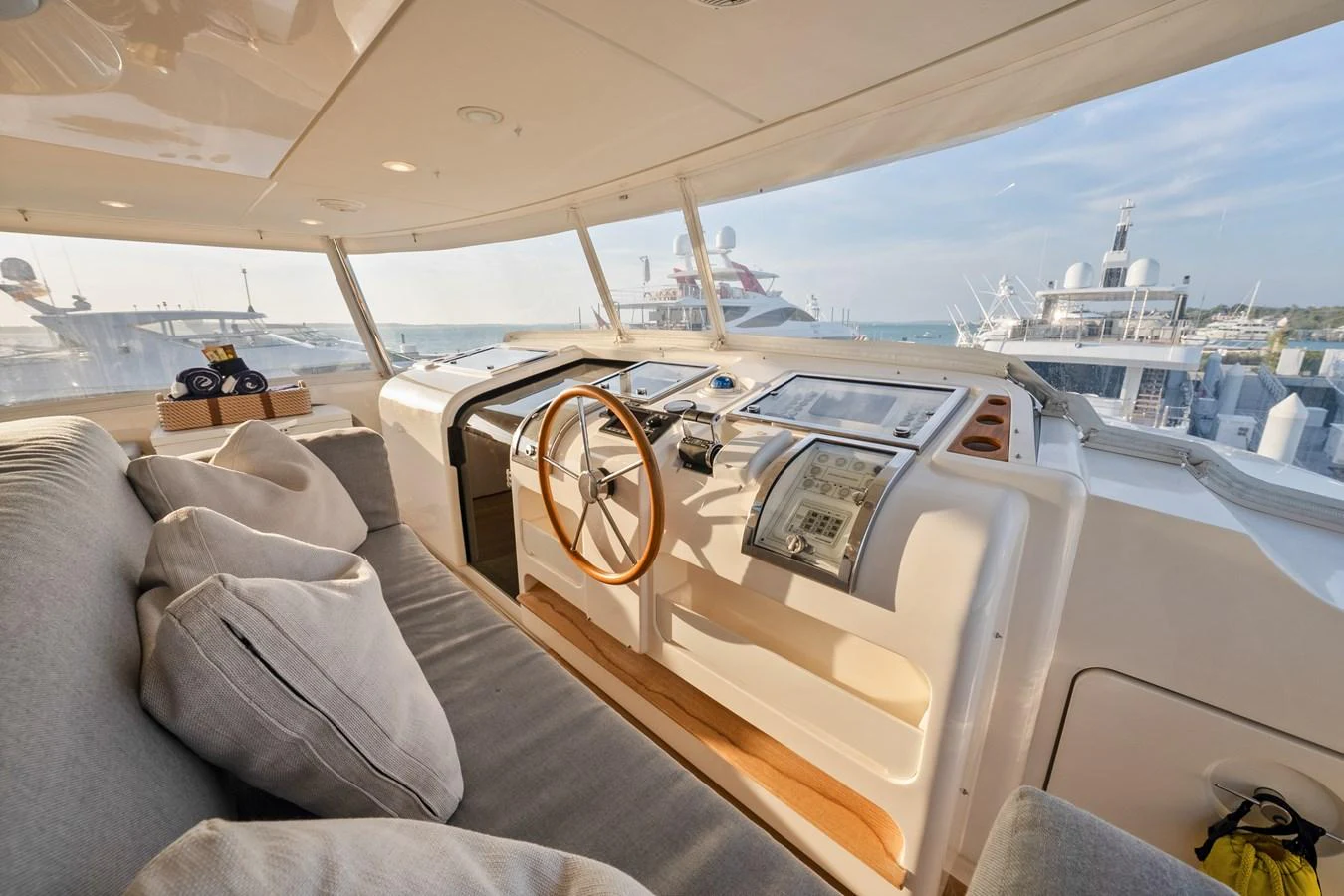 a boat with a steering wheel aboard FONTANA Yacht for Sale