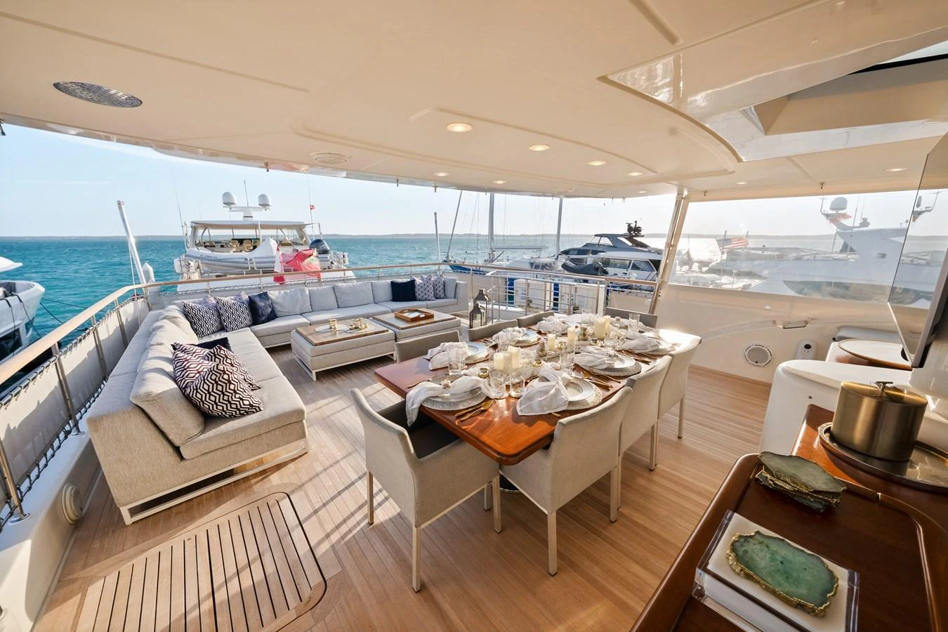 a large living room with a large deck aboard FONTANA Yacht for Sale