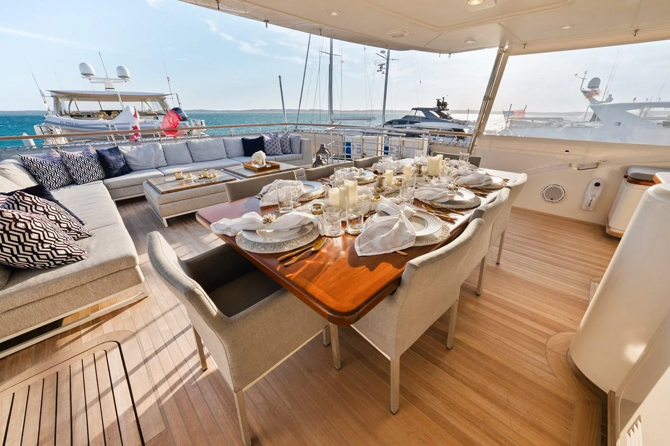a table with plates and glasses on it aboard FONTANA Yacht for Sale