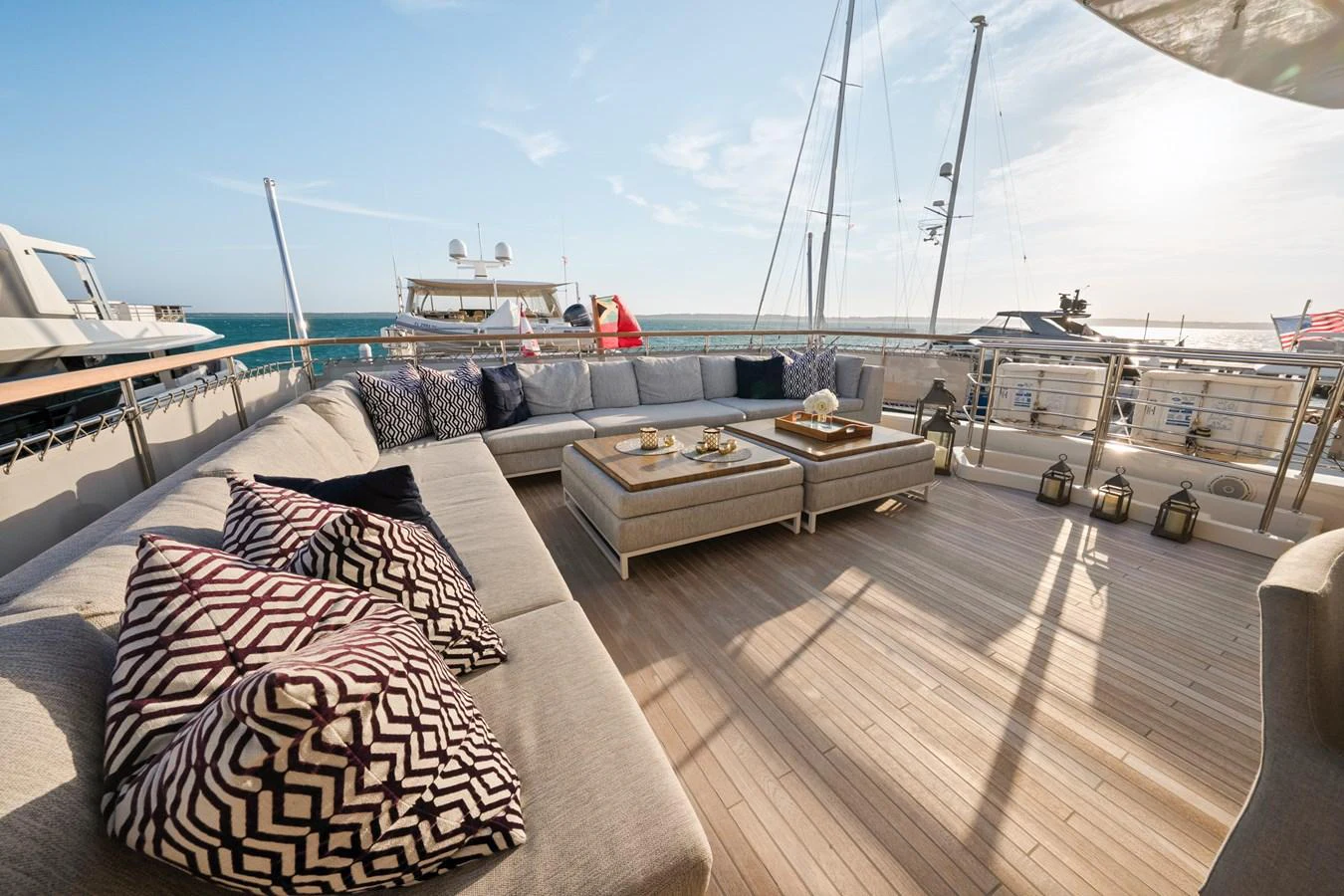 a deck with a couch and a table on it aboard FONTANA Yacht for Sale