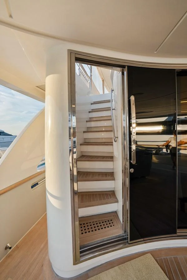 a large metal door with a glass door aboard FONTANA Yacht for Sale