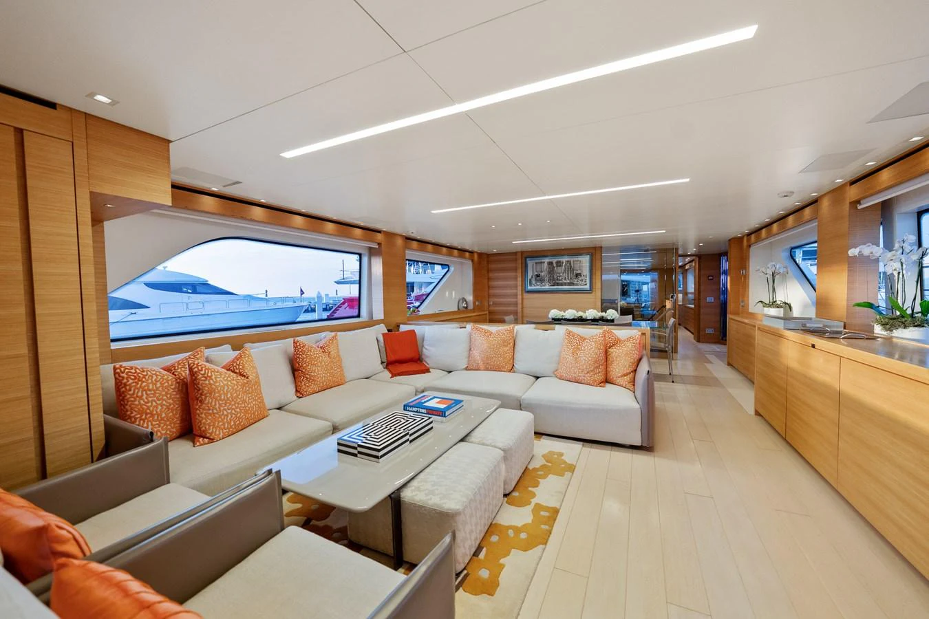 a living room with a large window aboard FONTANA Yacht for Sale