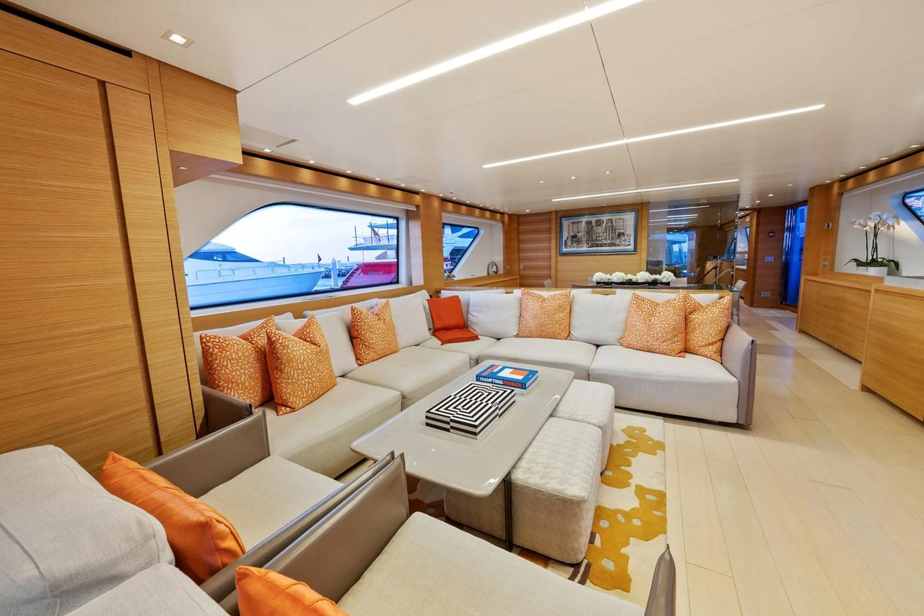 a living room with a large window aboard FONTANA Yacht for Sale