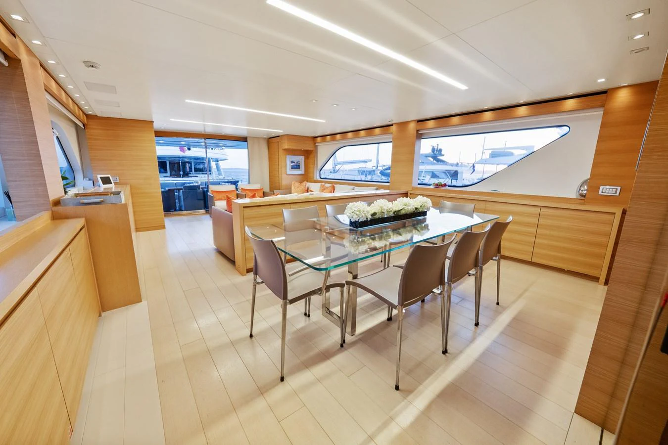 a room with a table and chairs aboard FONTANA Yacht for Sale
