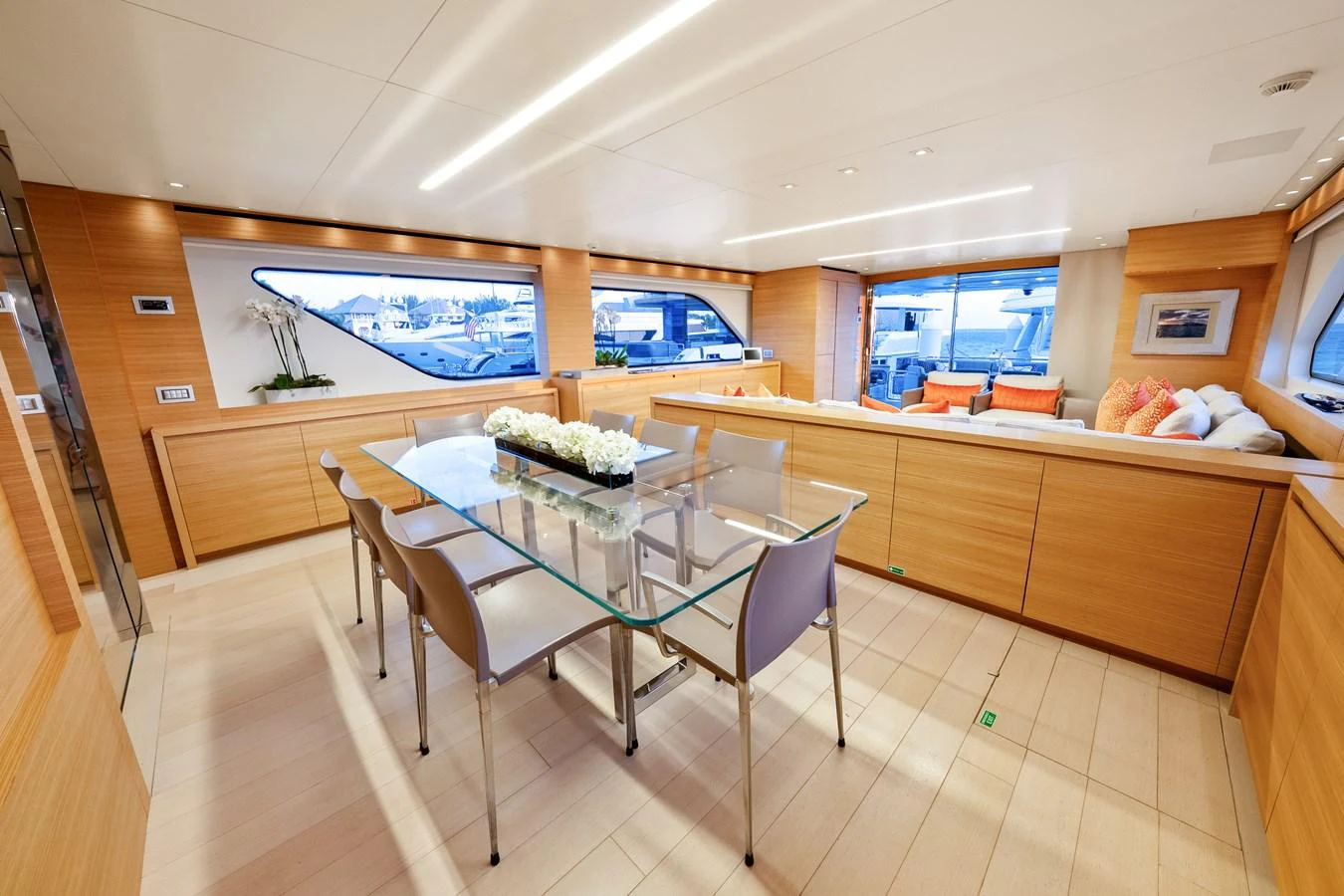 a kitchen with a table and chairs aboard FONTANA Yacht for Sale