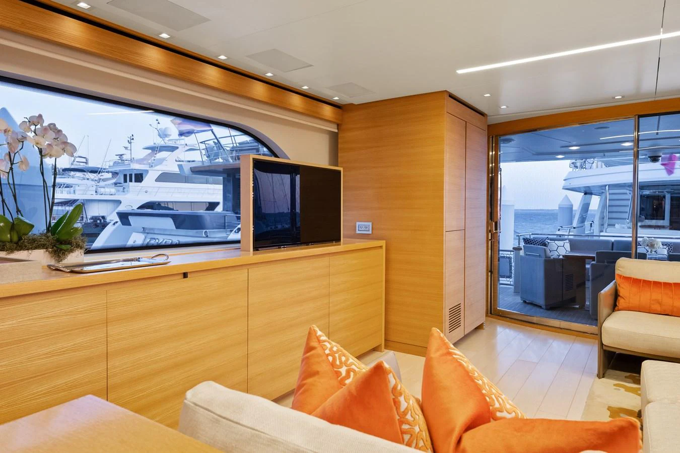 a room with a tv and furniture aboard FONTANA Yacht for Sale