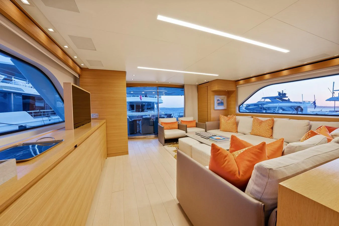 a living room with a large window aboard FONTANA Yacht for Sale