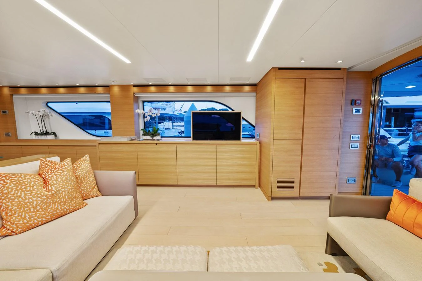 a room with couches and a tv aboard FONTANA Yacht for Sale