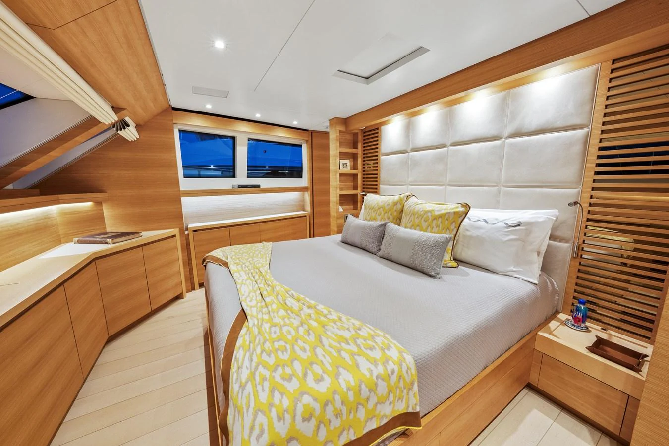 a room with a bed and a chair aboard FONTANA Yacht for Sale