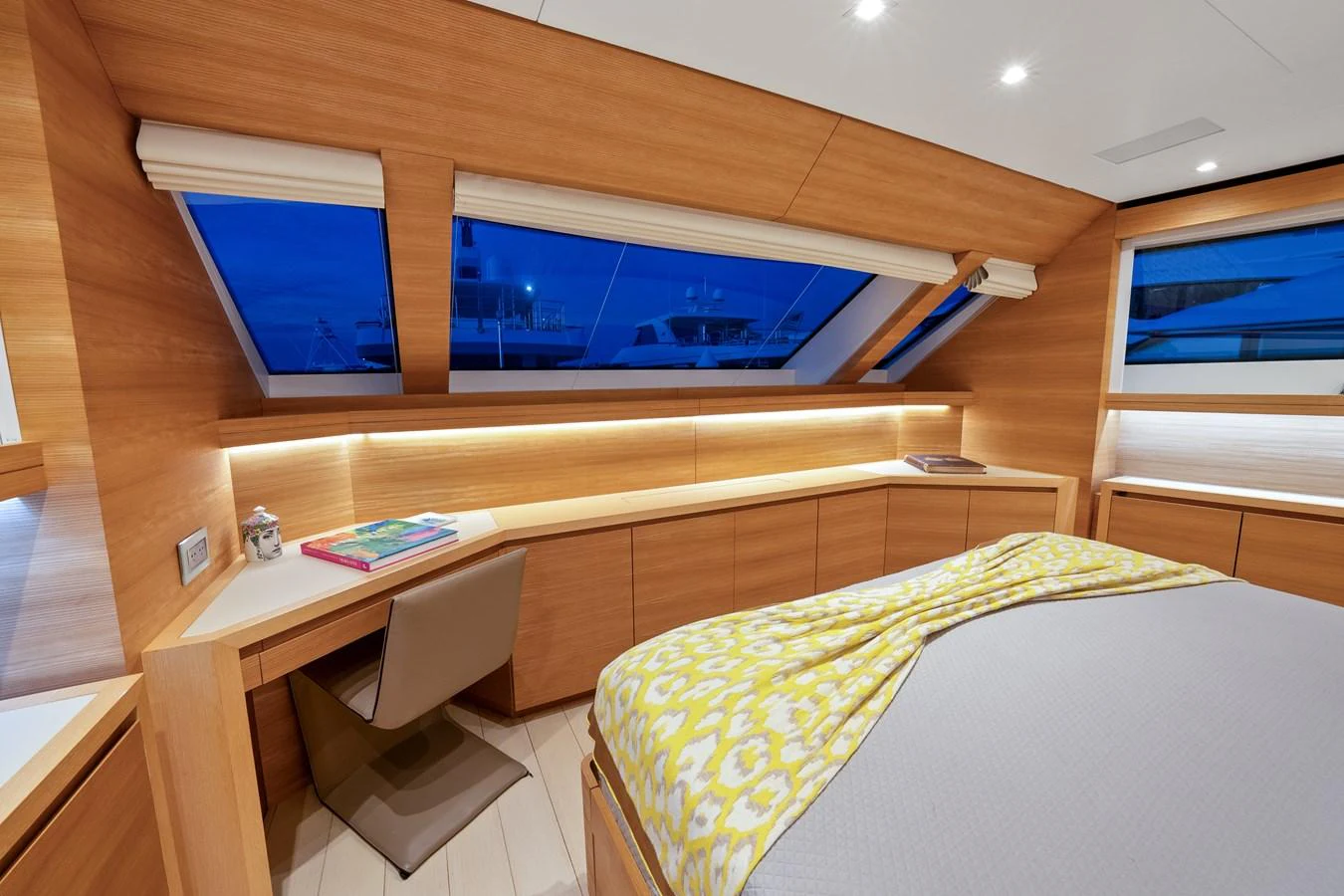 a room with a bed and a desk aboard FONTANA Yacht for Sale
