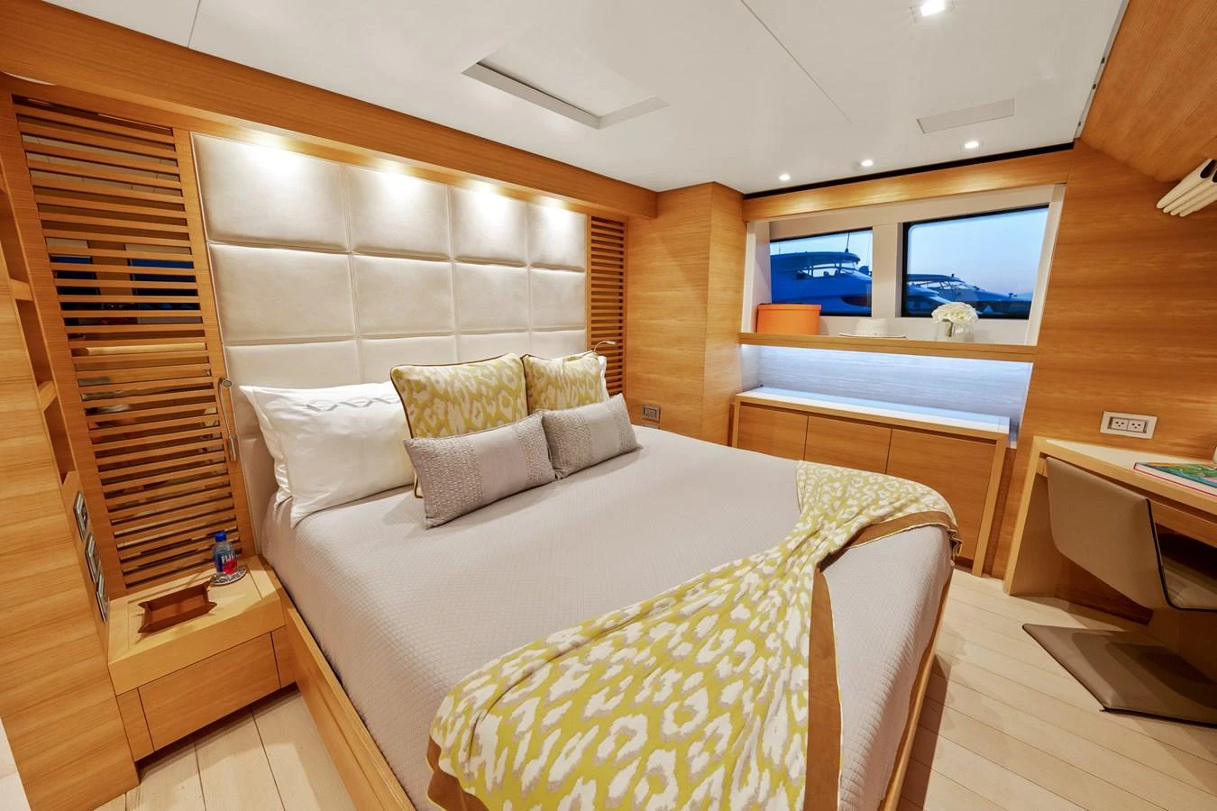 a room with a bed and a television aboard FONTANA Yacht for Sale