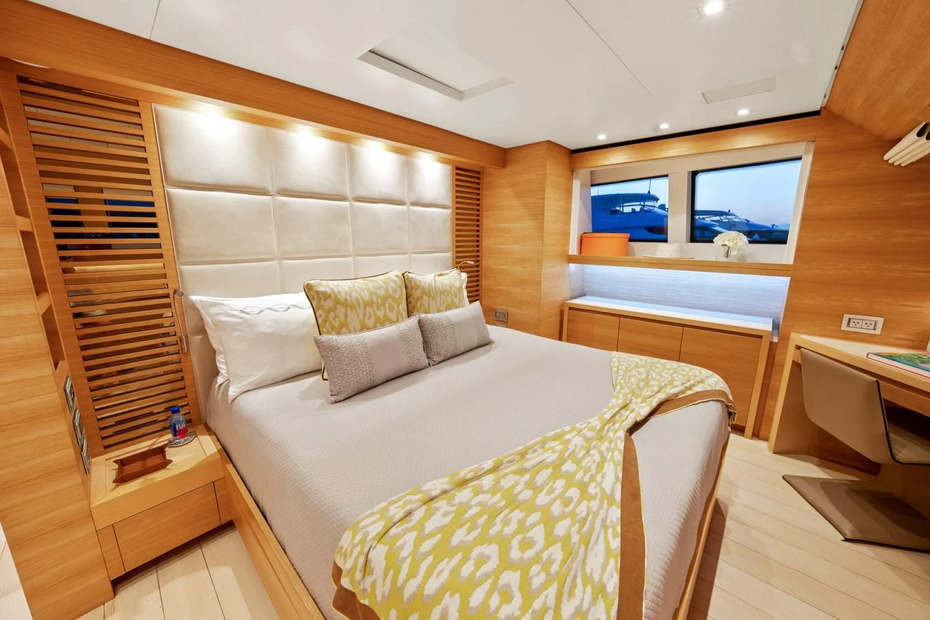 a room with a bed and a television aboard FONTANA Yacht for Sale