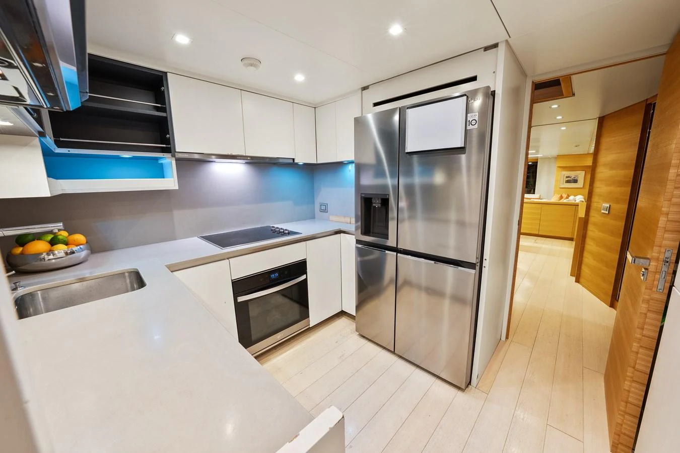 a kitchen with stainless steel appliances aboard FONTANA Yacht for Sale