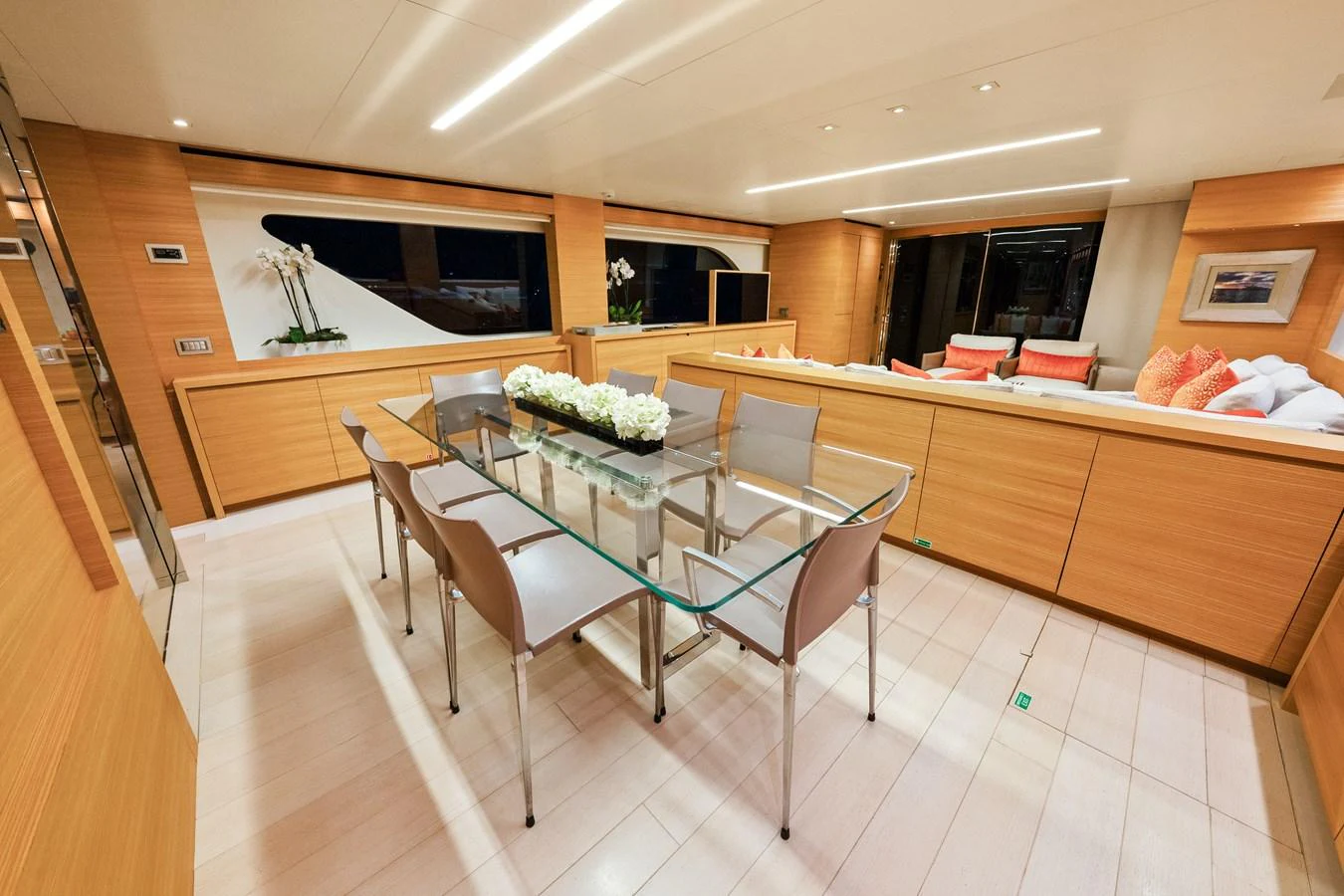 a large kitchen with a dining table aboard FONTANA Yacht for Sale