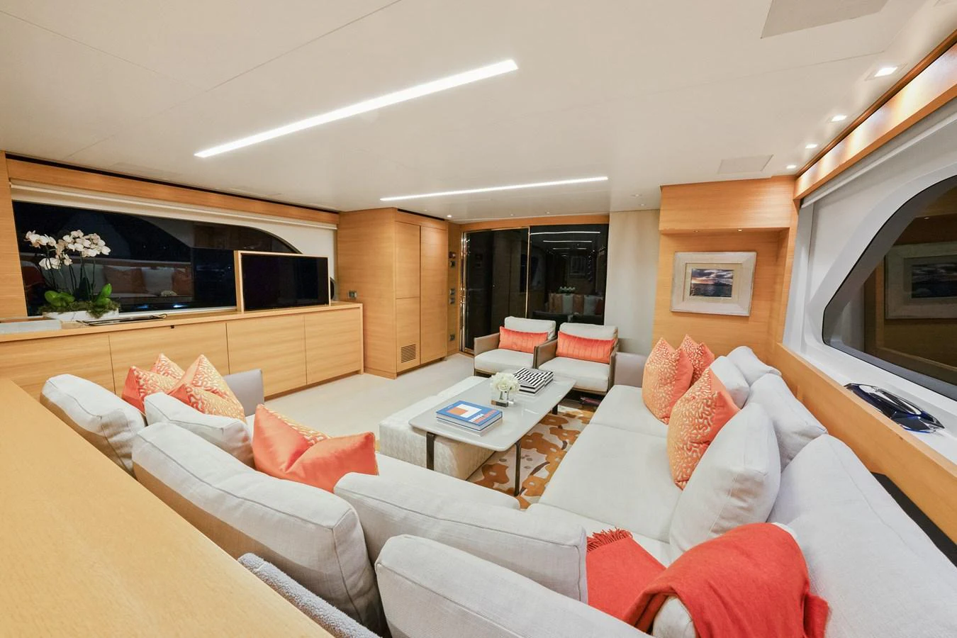 a living room with a couch and a television aboard FONTANA Yacht for Sale