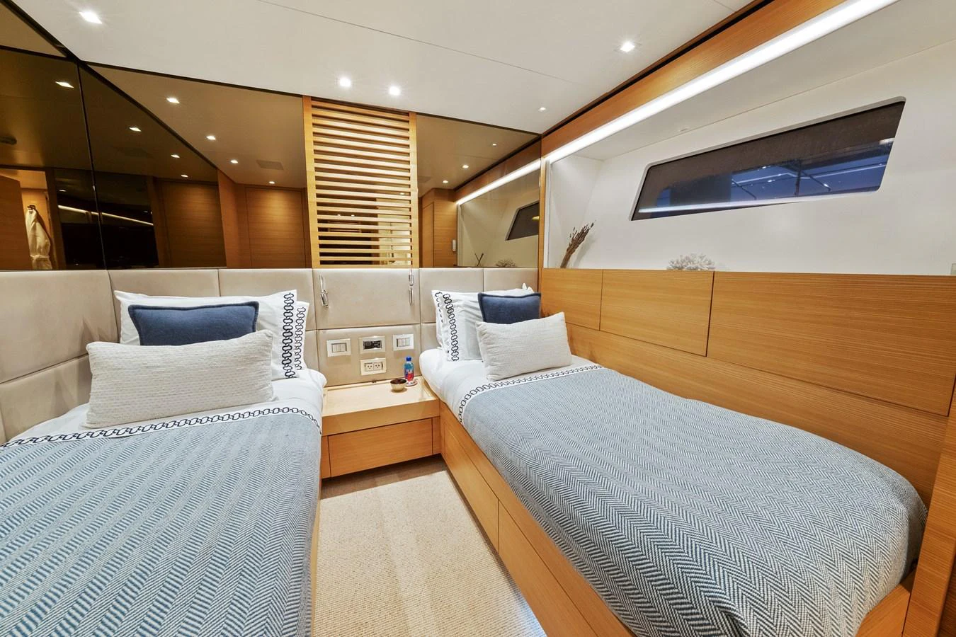 a room with a bed and a television aboard FONTANA Yacht for Sale