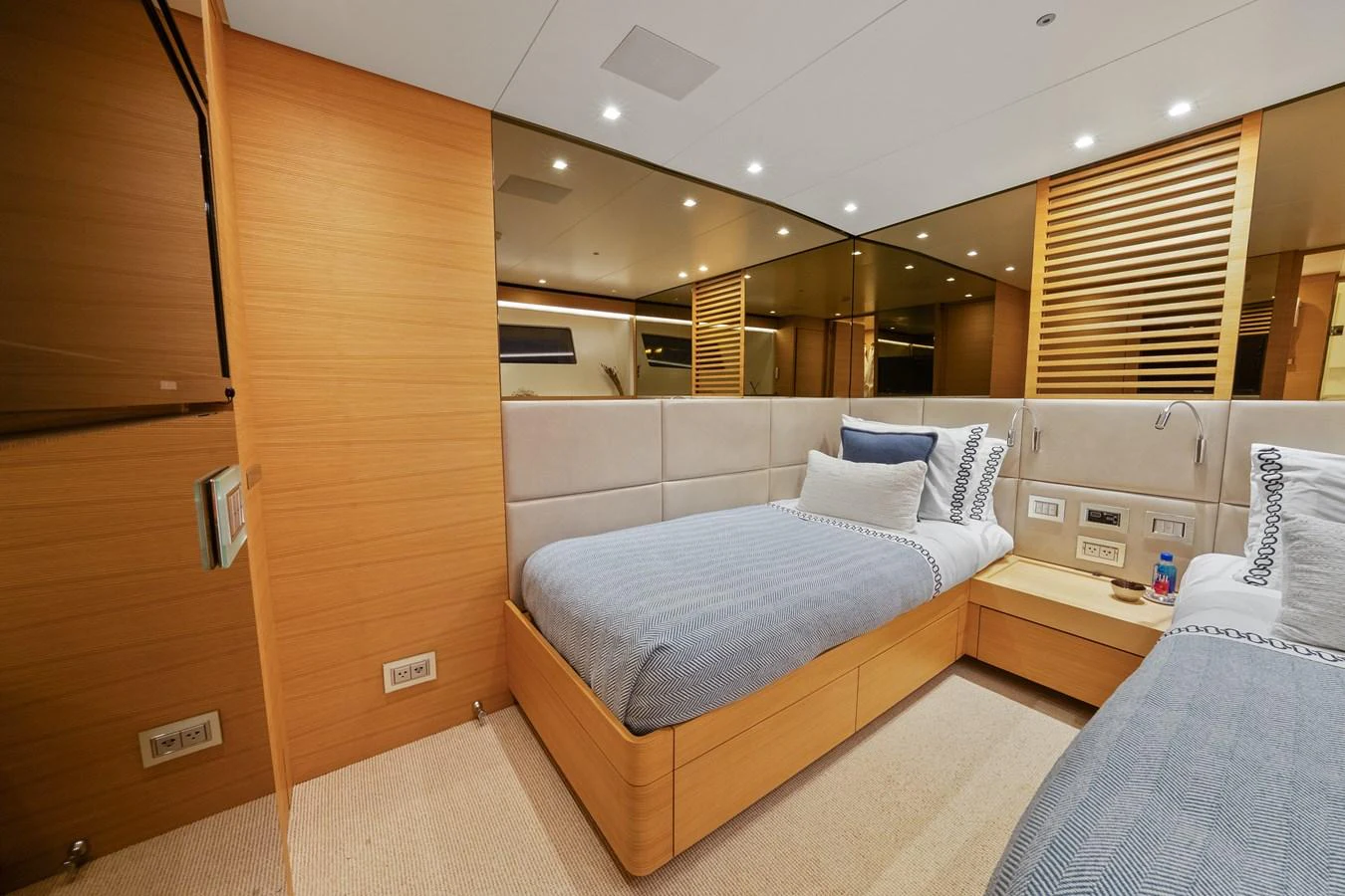 a room with a bed and a couch aboard FONTANA Yacht for Sale