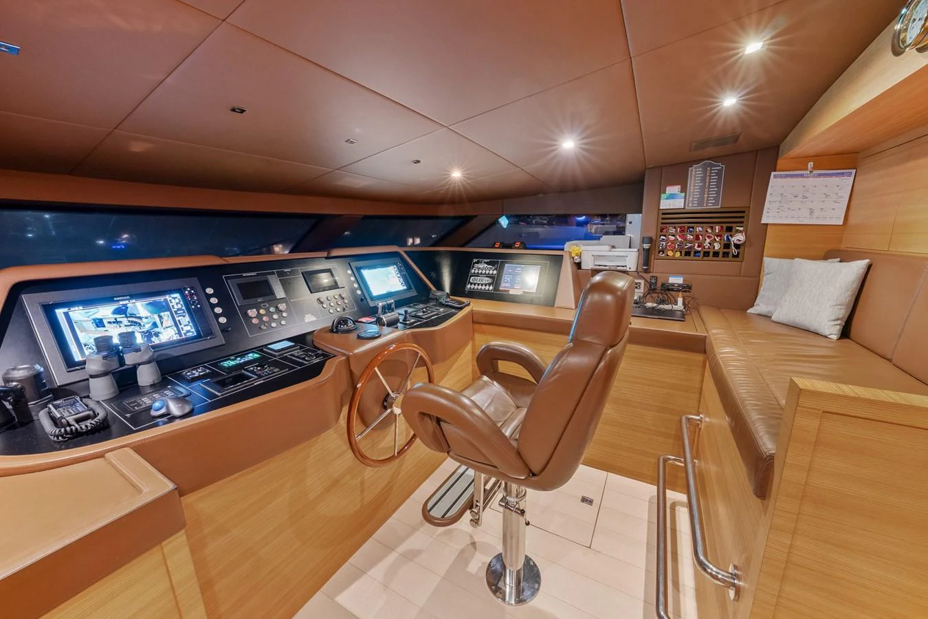 a room with a desk and chairs aboard FONTANA Yacht for Sale