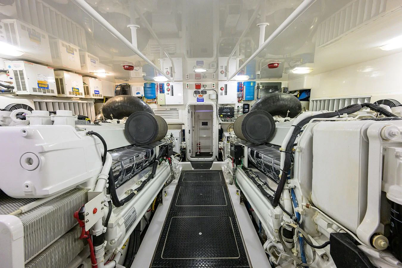 The yacht's engine room showcases powerful and well-maintained machinery, emphasizing its robust engineering. aboard WASABI Yacht for Sale