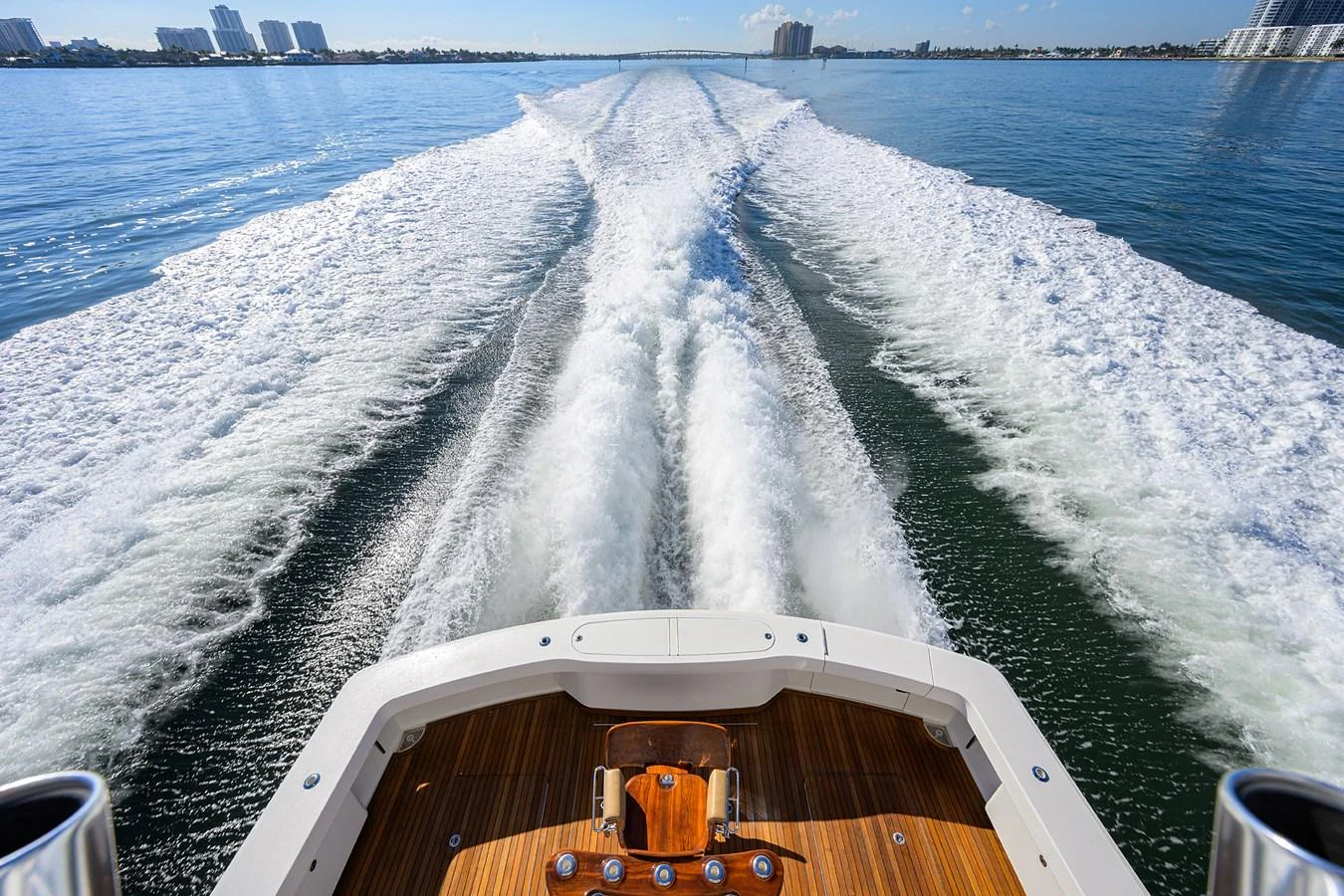 The yacht's aft deck offers a stunning view of the wake as it speeds across the water. aboard WASABI Yacht for Sale