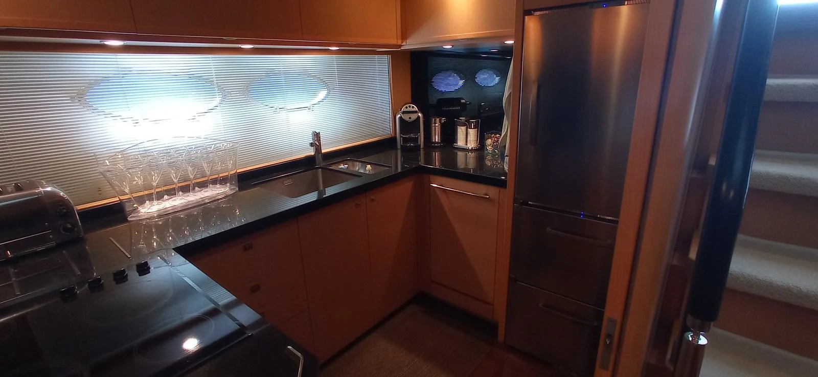 The yacht's galley features modern appliances and ample counter space for meal preparation. aboard SFYFALL Yacht for Sale