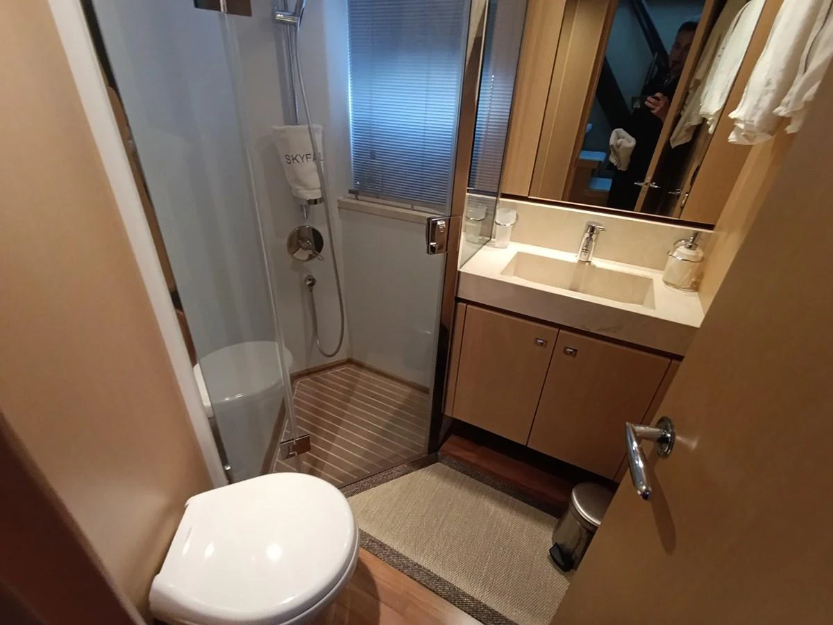 A well-appointed yacht bathroom with modern fixtures and a clean design. aboard SFYFALL Yacht for Sale