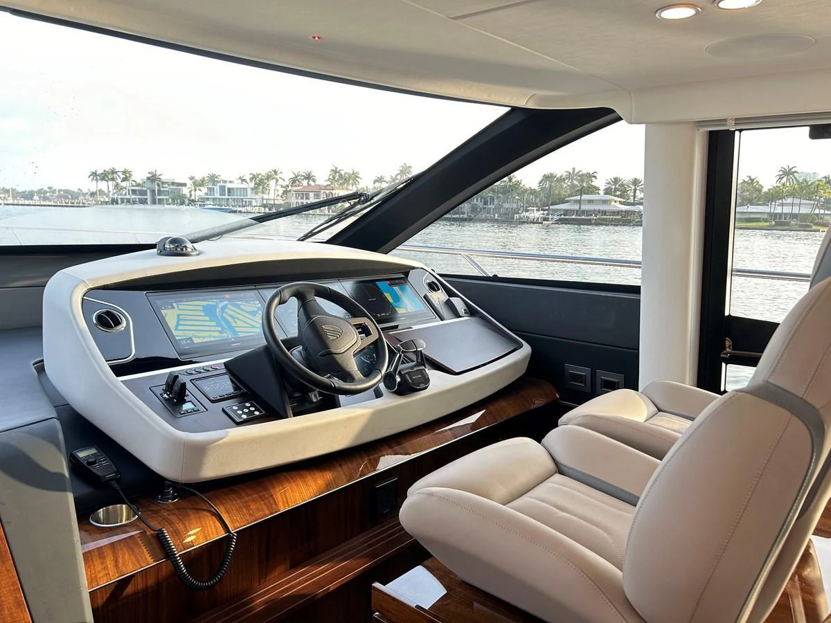 The helm station offers a sophisticated and modern control area with a panoramic view. aboard FAIRLINE SQUADRON Yacht for Sale