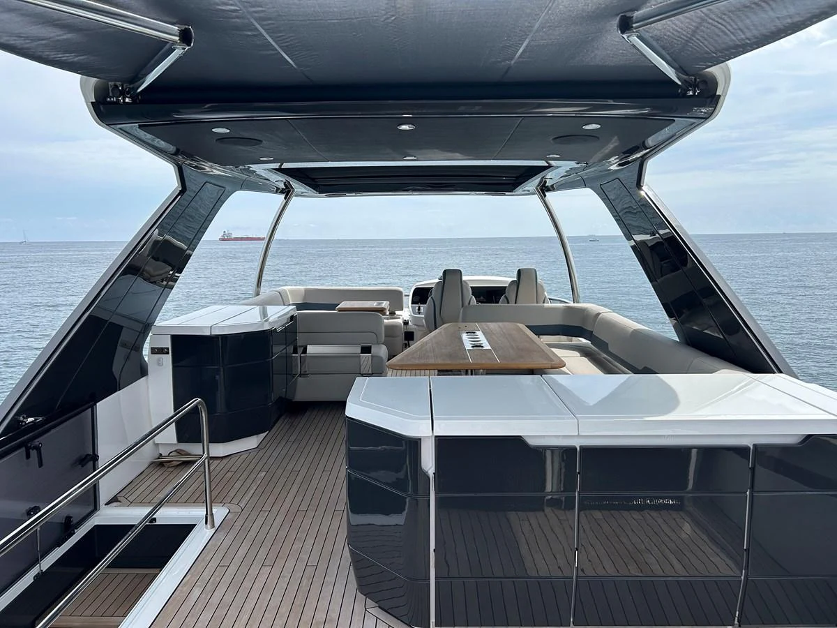The aft deck offers a spacious and stylish area for relaxation and entertainment with a stunning view of the sea. aboard FAIRLINE SQUADRON Yacht for Sale