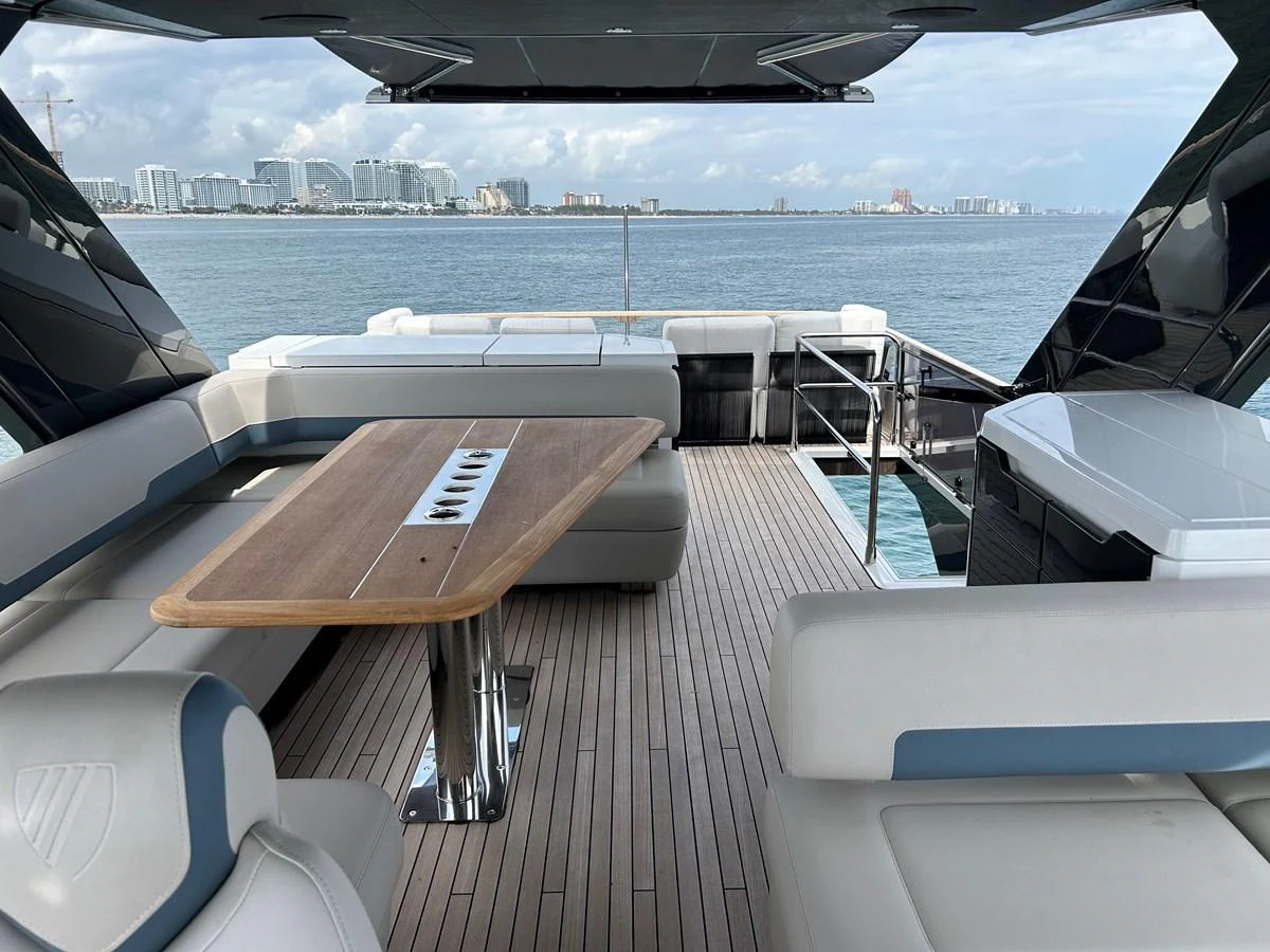 The aft deck offers a spacious and stylish area for relaxation and dining with stunning views of the water. aboard FAIRLINE SQUADRON Yacht for Sale