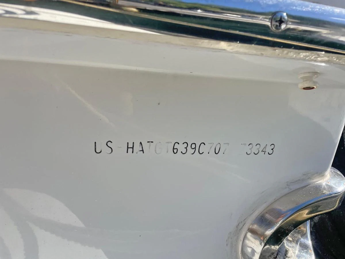 A close-up view of the yacht's hull identification number (HIN) plate. aboard HATTERAS 68 CONVERTIBLE Yacht for Sale
