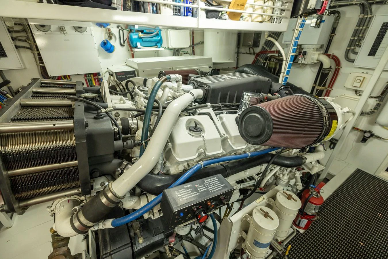 The image showcases the well-maintained engine room of the yacht, featuring advanced machinery and equipment. aboard OUTRAGEOUS Yacht for Sale