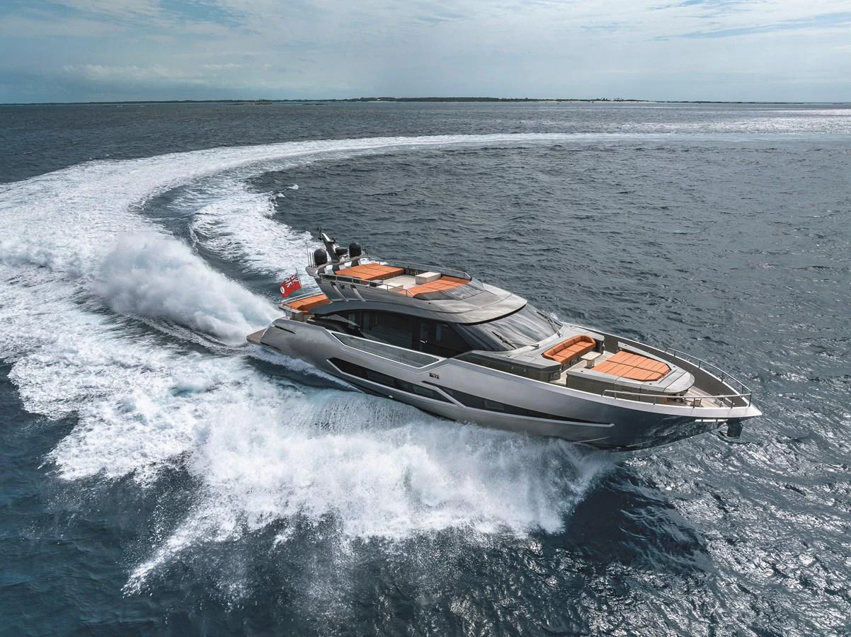 A sleek and modern yacht cruises swiftly through open waters, leaving a dramatic wake behind. aboard AB 80 Yacht for Sale
