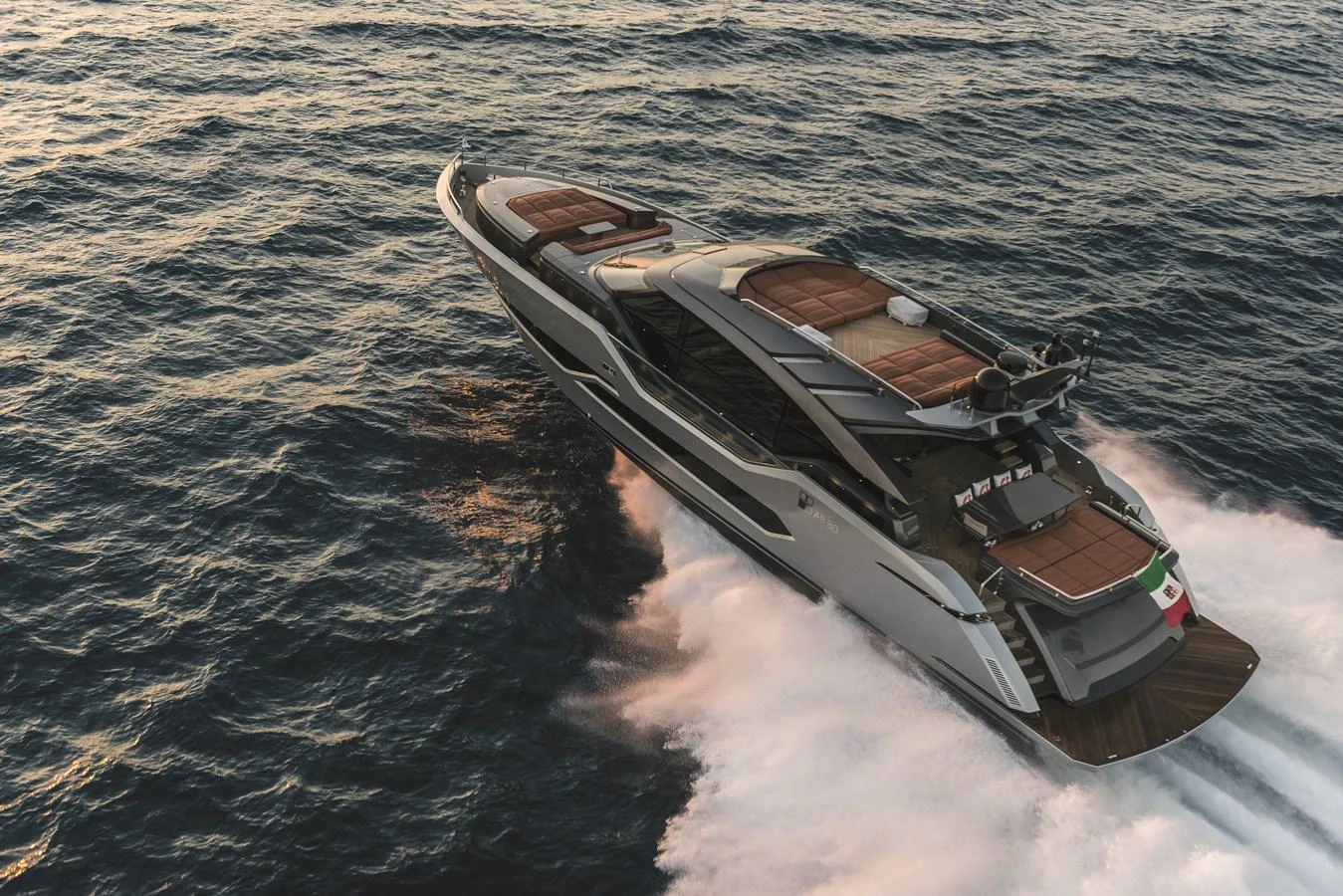 A sleek, modern yacht cruises swiftly through the open sea, showcasing its luxurious design and powerful performance. aboard AB 80 Yacht for Sale