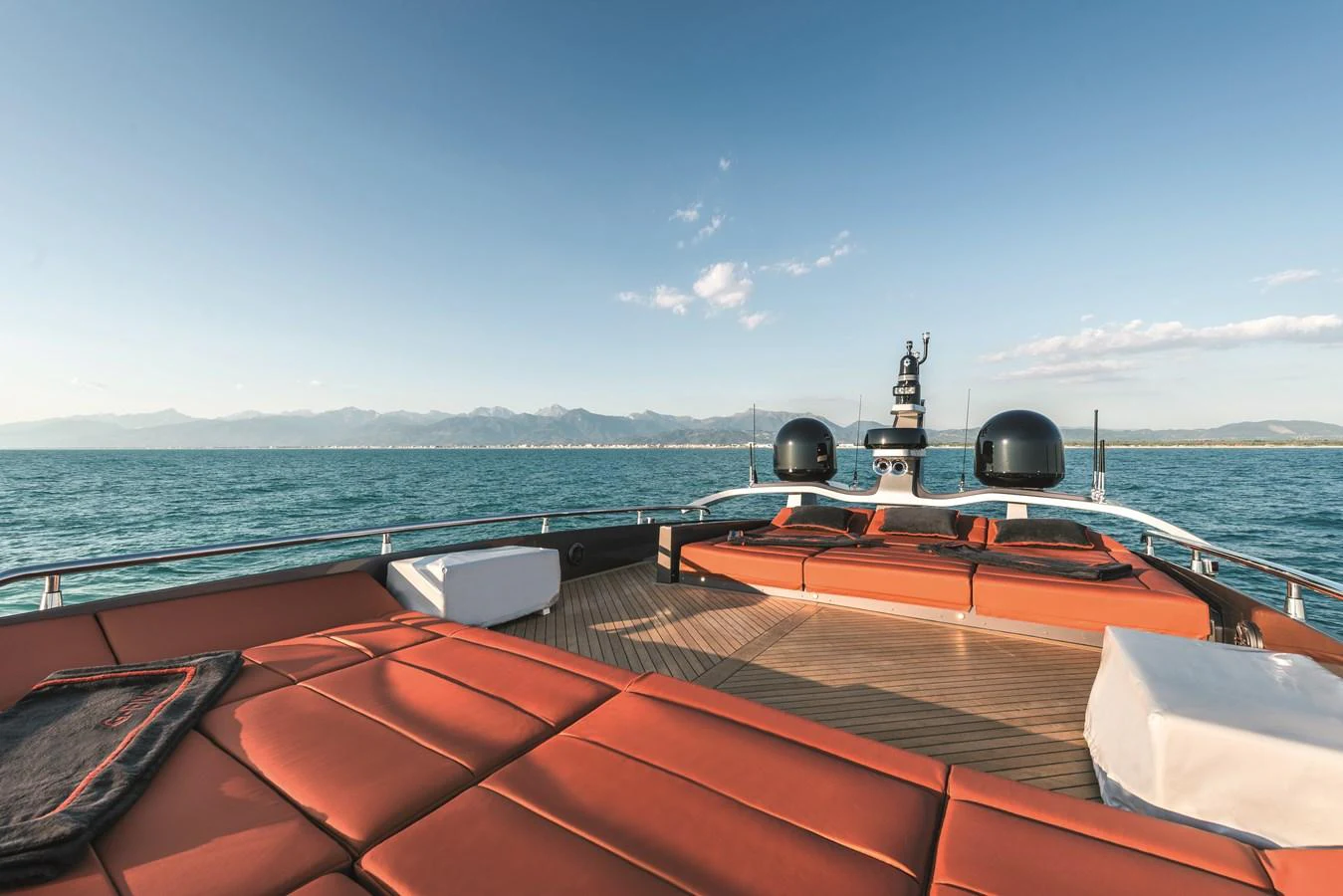 The yacht's foredeck features luxurious sun pads and a stunning view of the open sea. aboard AB 80 Yacht for Sale