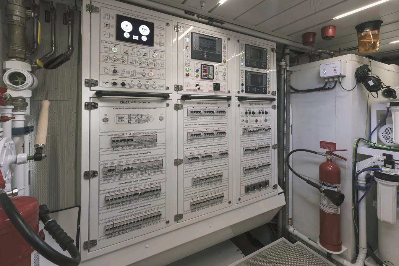 The image showcases the yacht's engine room with detailed control panels and safety equipment. aboard AB 80 Yacht for Sale