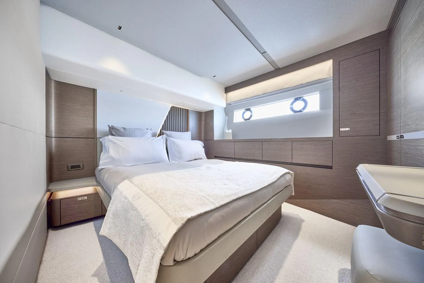 A luxurious stateroom with a comfortable bed and modern design elements. aboard POLARIS Yacht for Sale